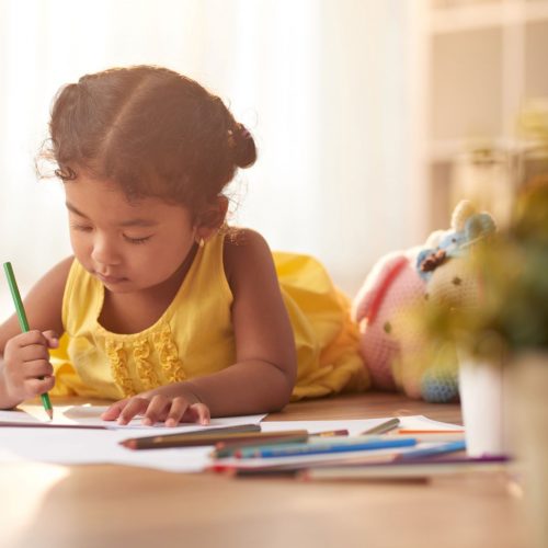 little-girl-focused-drawing